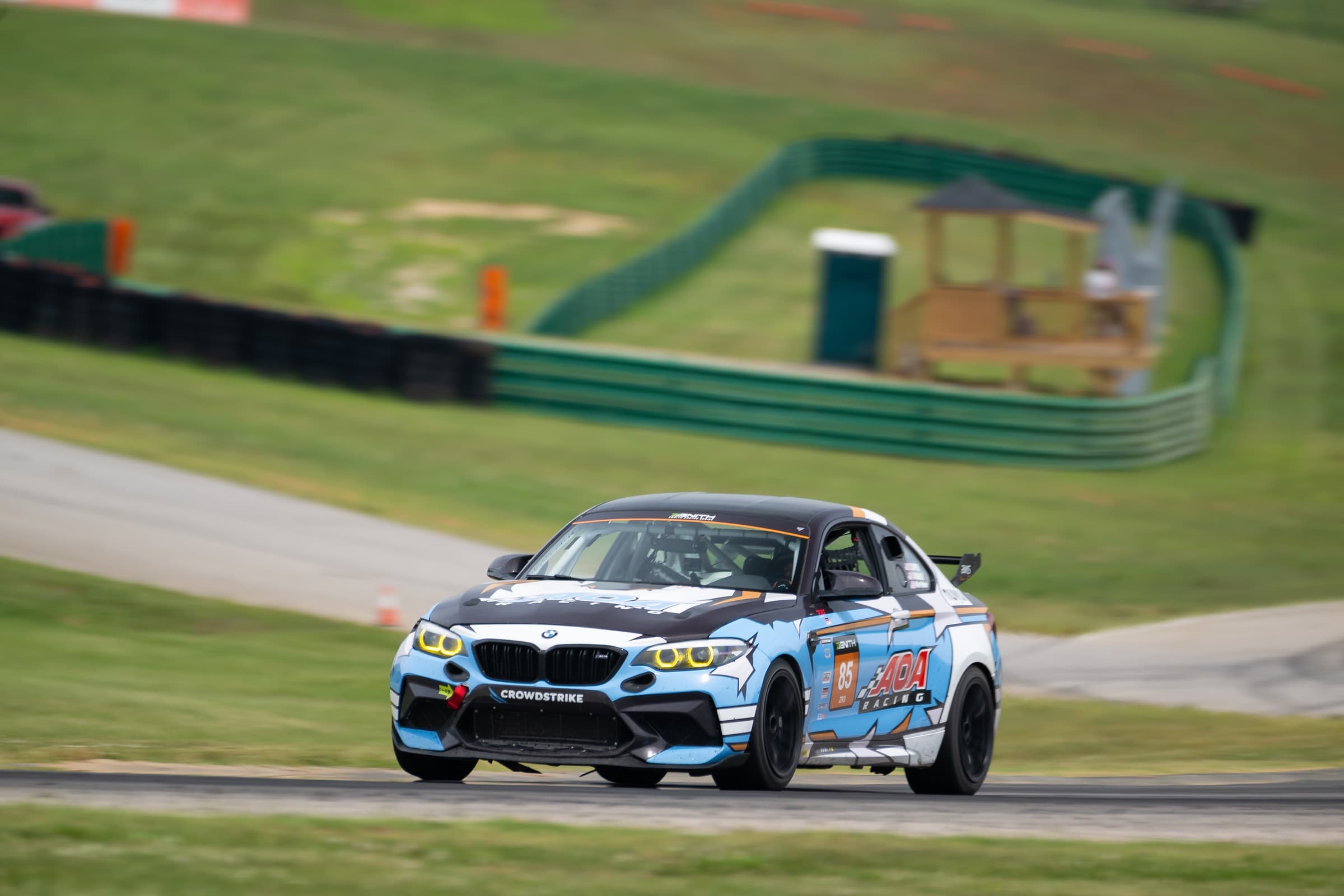 AOA race weekend energy — grid rolling out at VIR